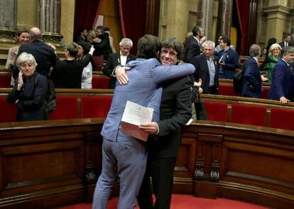 Catalan premier Carles Puigdemont and fellow separatists celebrating the vote.