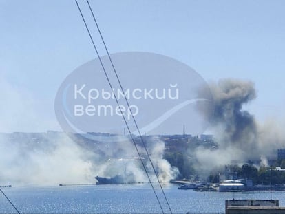 This image taken from UGC video shows smoke rising from the headquarters of Russia’s Black Sea Fleet in Sevastopol, Crimea.