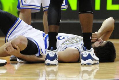 Ricky Rubio lies prostrate after his collision with Kobe Bryant during the Minnesota-Lakers game.