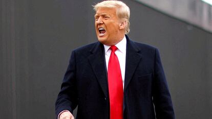 U.S. President Donald Trump yells as he visits the U.S.-Mexico border wall, in Alamo, Texas, U.S., January 12, 2021.