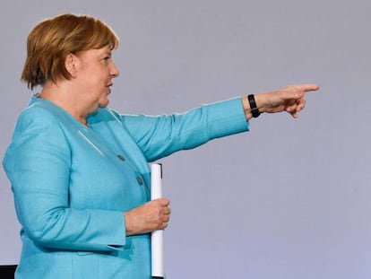 La canciller alemana Angela Merkel, junto al ministro de Finanzas Olaf Scholz, tras presentar el plan de estímulo económico. 