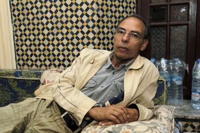 Maati Monjib, a Moroccan professor of political history and African studies at the University of Rabat, rests in his home after he was released from hospital in Rabat October 14, 2015. Monjib, who went on hunger strike a week ago, protesting against a travel ban and police harassment, has collapsed and is in hospital, members of his support committee said on Wednesday. Picture taken October 14, 2015.  REUTERS/Stringer