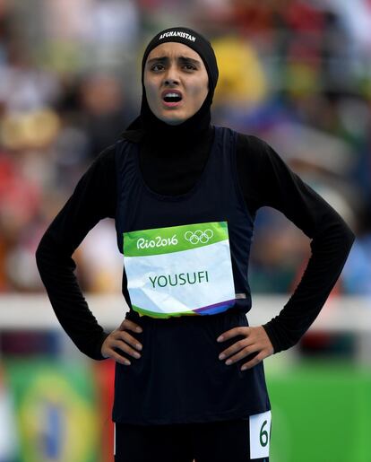 RIO DE JANEIRO, BRAZIL - AUGUST 12:  Kamia Yousufi of Afghanistan reacts after the competes in the Women's 100 metres preliminary on Day 7 of the Rio 2016 Olympic Games at the Olympic Stadium on August 12, 2016 in Rio de Janeiro, Brazil.  (Photo by Shaun Botterill/Getty Images)