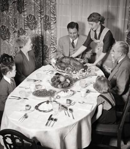 Cena familiar en 1950.