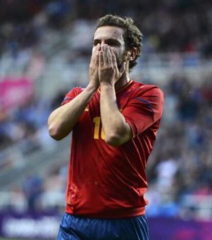 Juan Mata laments a missed chance.