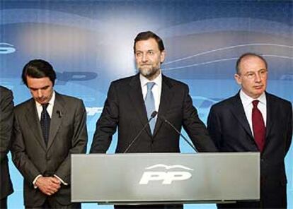 Mariano Rajoy ha comparecido junto a José María Aznar y Rodrigo Rato para felicitar al ganador.