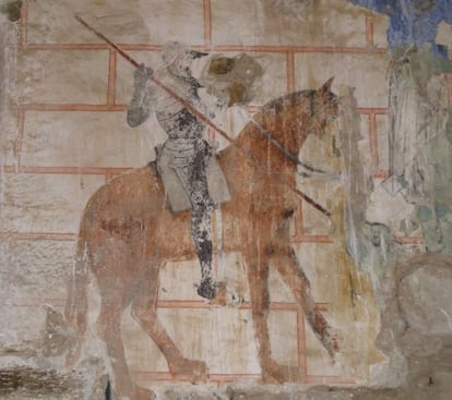 Pintura que representa a san Jorge, con armadura, lanza y montura, en la ermita gótica de Ruesga (Cantabria).