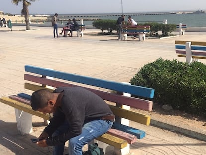 A young man on the seaside promenade in Dakhla.