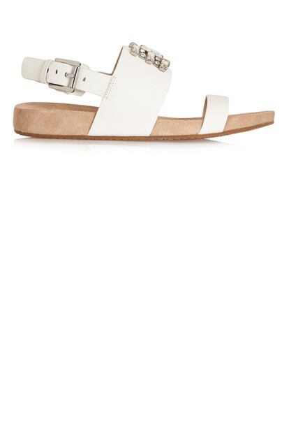 Sandalias planas con detalle de pedrera de Michael Kors (150 euros).