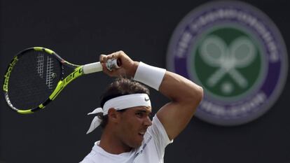 Spain's Rafael Nadal returns to Australia's John Millman during their Men's Singles Match on day one at the Wimbledon Tennis Championships in London Monday, July 3, 2017. (AP Photo/Tim Ireland)