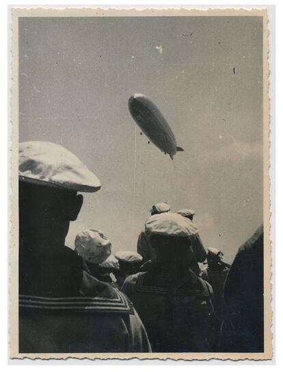 The Graf zeppelin watched by crowds on Tenerife.