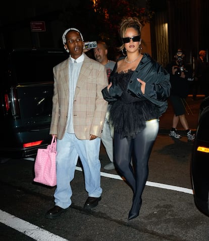 Rihanna with Balenciaga pantaboots, and A$AP Rocky wearing Bottega Veneta, pictured on their way to the Carbone restaurant on October 4, 2023, in New York.