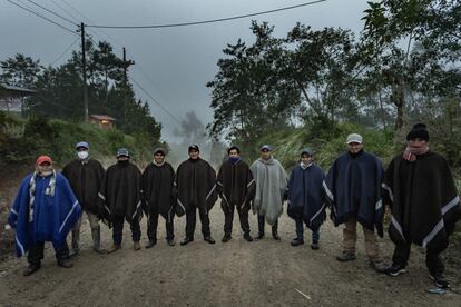 Security team for Pedro Castillo outside the latter's home in Chugur, in the Cajamarca region of Peru.