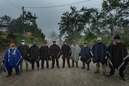 Security team for Pedro Castillo outside the latter's home in Chugur, in the Cajamarca region of Peru.