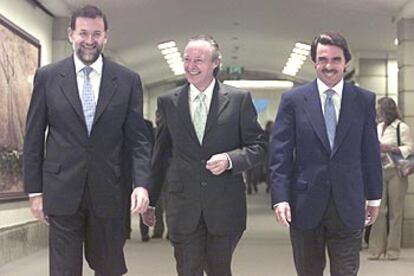 Mariano Rajoy, Josep Piqué y José María Aznar, ayer, en Barcelona.