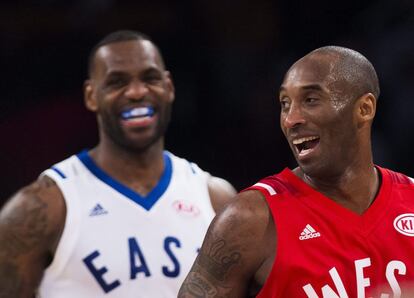 Western Conference's Kobe Bryant, of the Los Angeles Lakers, (24) and Eastern Conference's LeBron James, of the Cleveland Cavaliers, (23) laugh during second half NBA All-Star Game basketball action in Toronto on Sunday, Feb. 14, 2016. (Mark Blinch/The Canadian Press via AP) MANDATORY CREDIT