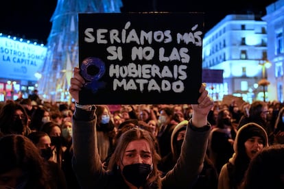 A protester in Madrid holds a sign with the message: “There would be more of us if you hadn't killed us.”