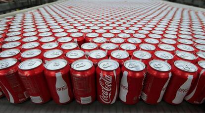 Cans of Coca- Cola Co soda move along a conveyor belt at the company&#039; s Swire bottling plant in Salt Lake City Utah 