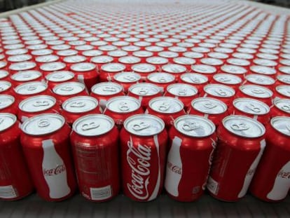 Cans of Coca- Cola Co soda move along a conveyor belt at the company&#039; s Swire bottling plant in Salt Lake City Utah 