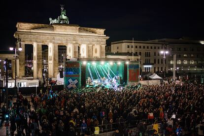 Secretary-General at the German Advisory Council on Global Change (WBGU), Maja Goepel (R), speaks during a rally and a concert on the occasion of the upcoming referendum on climate neutrality in front of the Brandenburg Gate in Berlin, Germany, 25 March 2023.