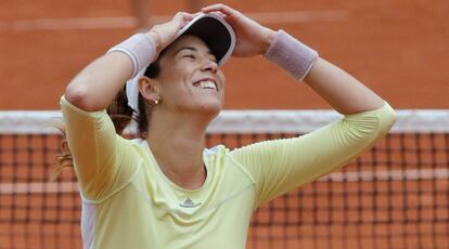 Muguruza celebra su victoria ante Rogers.