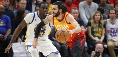 Ricky Rubio y Draymond Green.