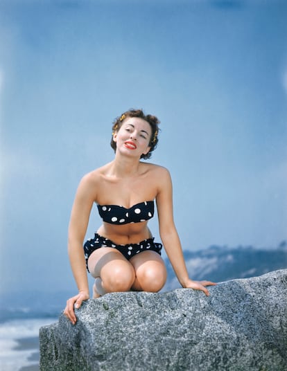 Louis Réard presented the first bikini in Paris in 1946. In the picture, a model wears a bikini in 1950.