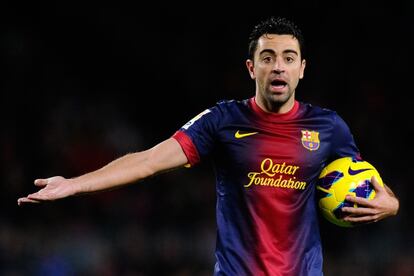 Xavi, durante un partido con el Barça.