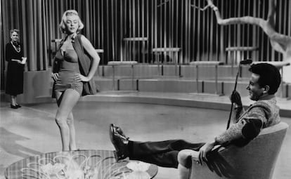 Marilyn Monroe, en la escena de C&oacute;mo casarse con un millonario.