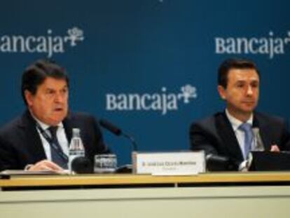 Jos&eacute; Luis Olivas, expresidente de Bancaja, y Aurelio Izquierdo, exdirector general. 