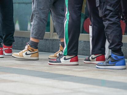 A line of customers waiting for the launch of a new model of the brand's star sneakers at a Nike store in Shanghai in October 2019.
