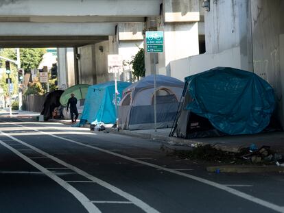 A homeless encampment under an overpass in Oakland