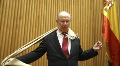 Rodrigo Rato, ministre d'Economia amb Aznar, arribant a la comissió parlamentària.