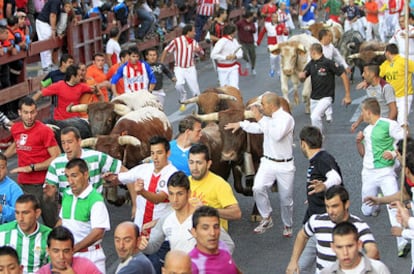 Los mozos participan en el cuarto encierro de las fiestas de San Sebastián de los Reyes en agosto de 2019.