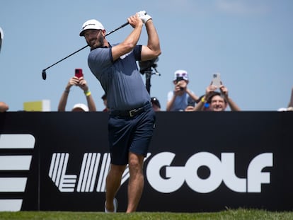 US golfer Dustin Johnson tees off on the 1st tee during the first round of 2023 LIV Golf DC at Trump National Golf Club in Sterling, Virginia, in May 2023.