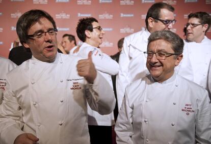 Carles Puigdemont i el delegat del Govern espanyol a Catalunya, Enric Millo, a la presentació de la Guia Michelin.
