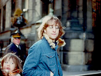 John Lennon in New York in 1977. At the left of the image are Yoko Ono and the couple's son, Sean.