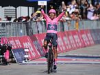 Overall leader Team Ineos rider Colombia's Egan Bernal celebrates as he crosses the finish line to win the Giro d'Italia 2021 cycling race, after the 21st and last stage of the Giro d'Italia 2021 cycling race, a 30.3km individual time trial between Senago and Milan on May 30, 2021. (Photo by MIGUEL MEDINA / AFP)