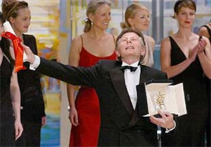 El director polaco Roman Polanski, ayer, en el Palacio de La Croisette después de recibir la Palma de Oro.