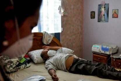 Adolfo Nieto, ill from taking tainted cough syrup, receives dialysis at his home in Panama.