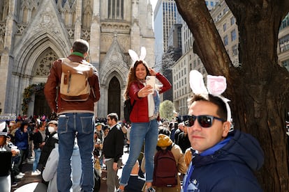 A woman takes a selfie during the New York Easter Parade