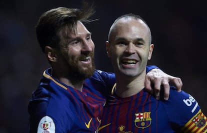 Leo Messi e Iniesta.