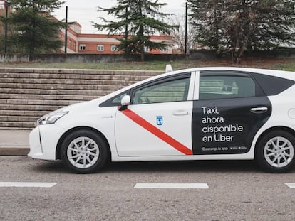 A taxi showing an ad for the new dual service.