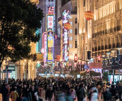 Shanghai,Nanjing road at night, busy with shoppers