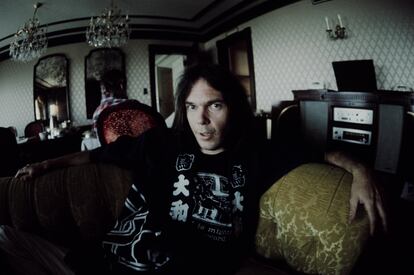 Neil Young in happi-coat relaxing