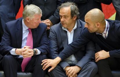 Platini, Ferguson y Guardiola, en una foto de 2011.