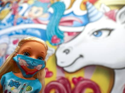 A Nancy doll, one of Spain's most beloved toys, is seen wearing a protective face mask at the headquarters of Spanish toy maker Famosa, in Madrid, Spain, November 30, 2020. Picture taken November 30, 2020. REUTERS/Sergio Perez