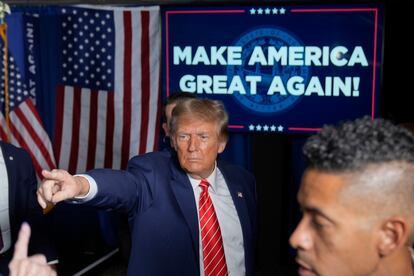 Republican presidential candidate Donald Trump greets supporters at a campaign event in Laconia, N.H., Monday, Jan. 22, 2024. 