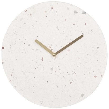 Reloj de mármol (14,99 euros) a la venta en Maisons du Monde.