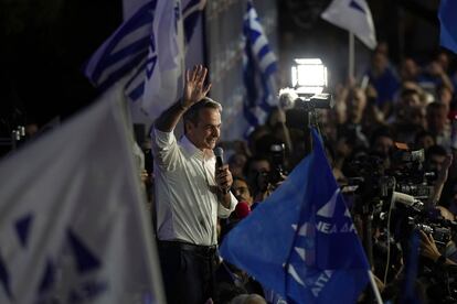 Kyriakos Mitsotakis leader of the center-right New Democracy addresses to supporters outside the headquarters of the party in Athens, Greece, Sunday, June 25, 2023.